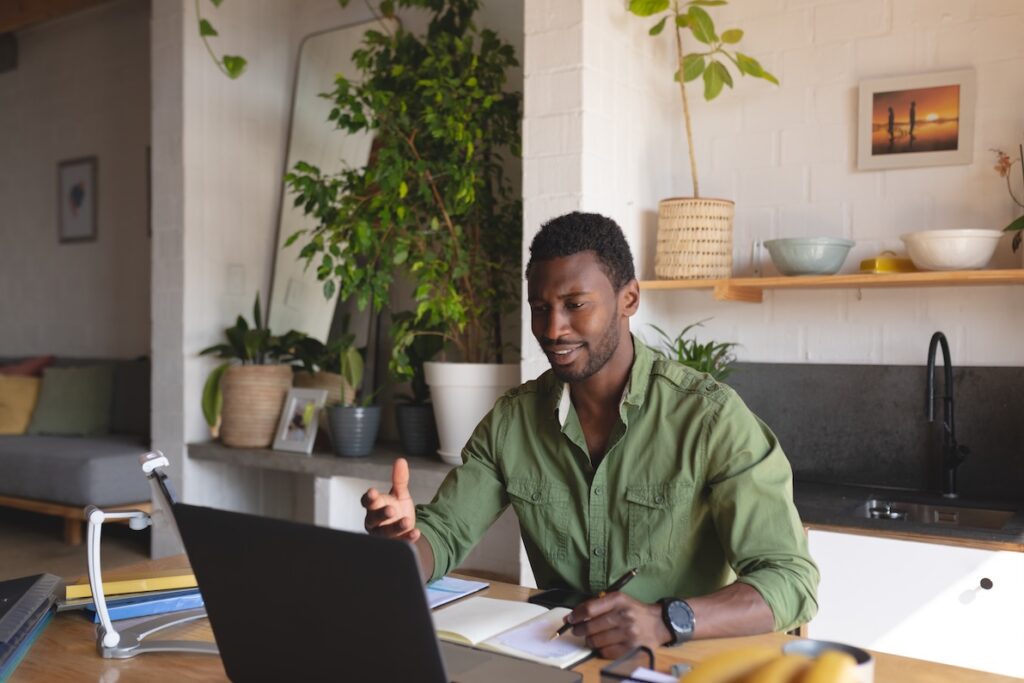 A happy employee in a work from home job.