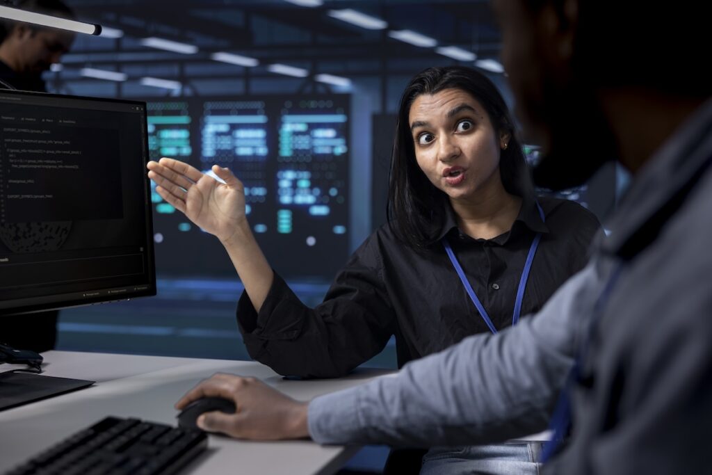 An intense technician discusses the intricacies of a cyber security job.